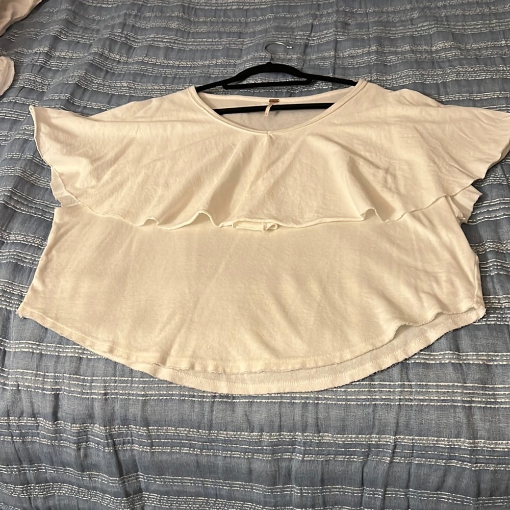 Free people, front shoulder flare size s. Brand new I never wear.